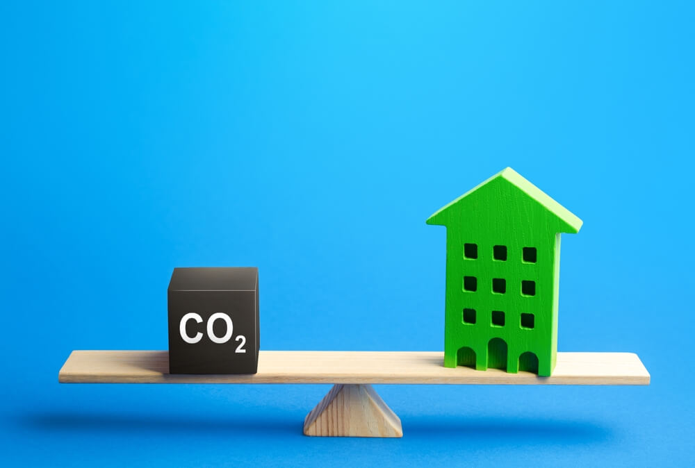 Residential Building and CO2 Emissions on Scales. Greenhouse Gas Emissions. Improving Energy Efficiency, Lowering Impact on Environment
