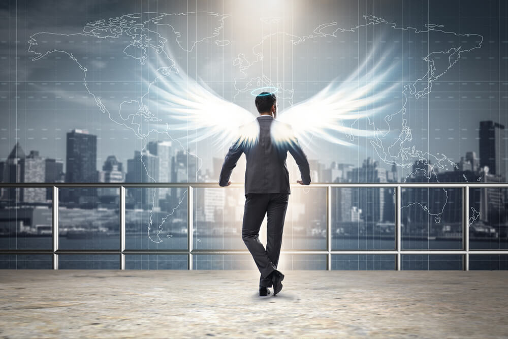 Angel Investor Concept With Businessman With Wings